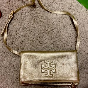 Tory Burch gold purse a few worn spots